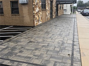 nicolock granite city alpine contemporary front entrance with double border raven